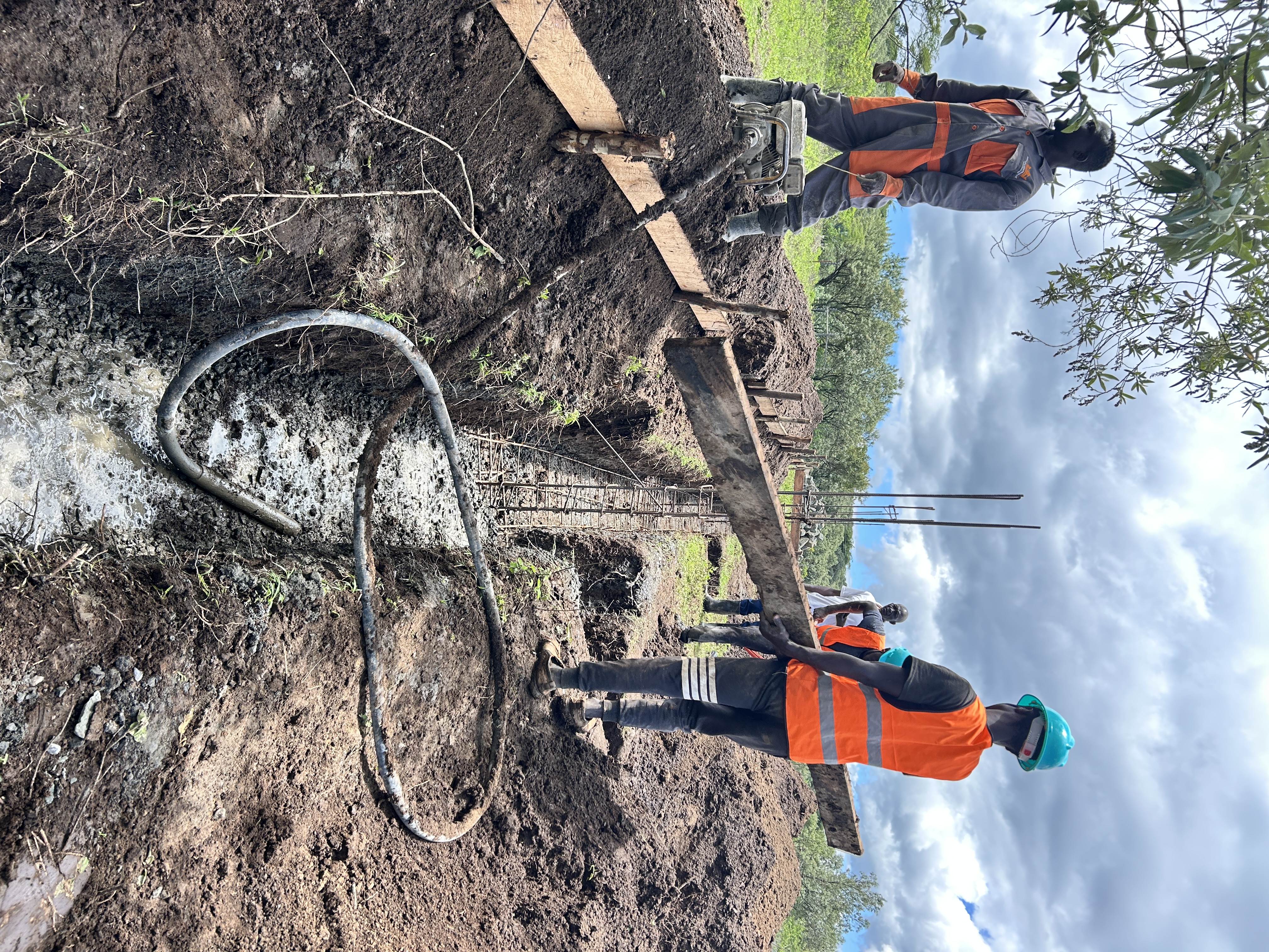 Concrete vibrator in use on the Lava & Lake foundation columns, Naivasha